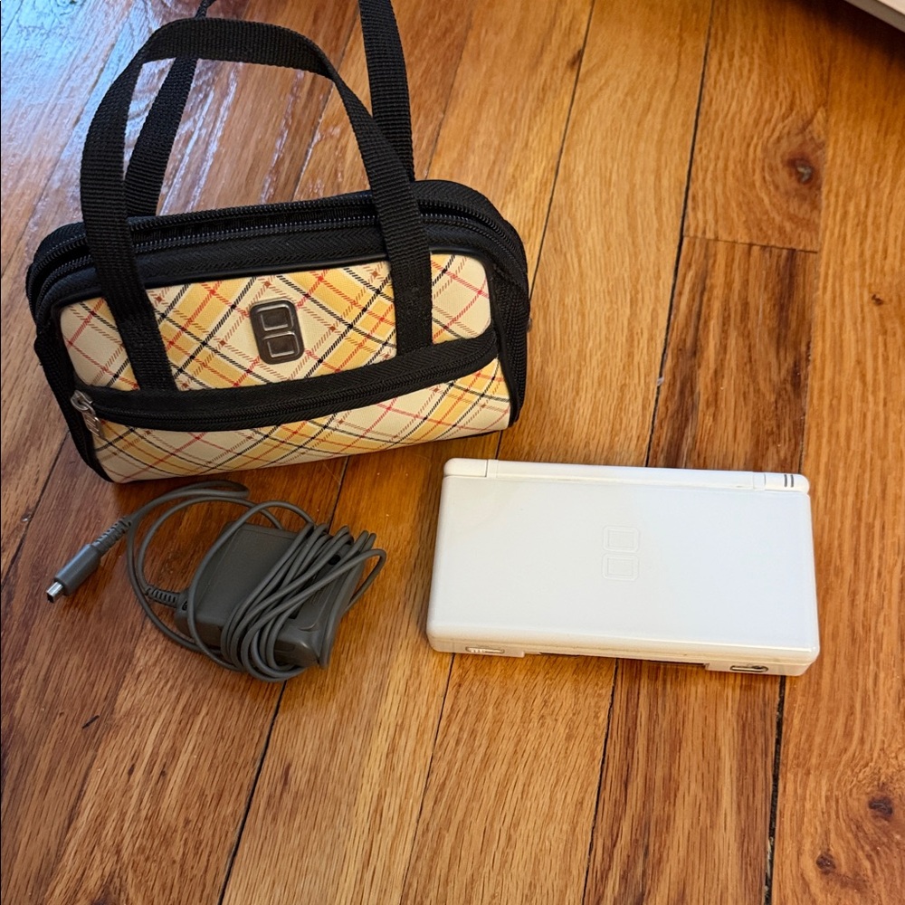 White Handheld Console with Plaid Carrying Case
